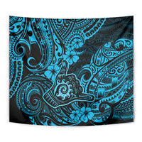 Blue Polynesian pattern tapestry with swirling motifs and hibiscus-style flowers