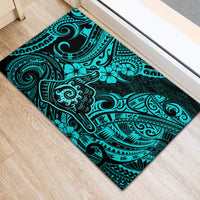 Turquoise rubber doormat with Polynesian tribal swirls and hibiscus floral pattern