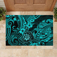 Turquoise rubber doormat with Polynesian tribal hand and floral motif