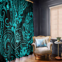 Turquoise and dark patterned window curtain panels with tribal motif and scalloped trim.