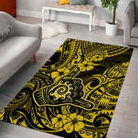 Yellow and black Polynesian patterned rectangular area rug with bold swirls and flowers
