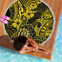 Round beach blanket with white fringe, yellow and black Polynesian tribal and floral pattern