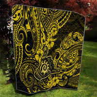 Polynesian shaka sign quilt with yellow tribal swirls, detailed borders, and flowers