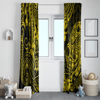 Yellow and black tropical tribal window curtain panels hanging on a rod