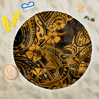 Round beach blanket (150cm) in black and gold Polynesian-style pattern, white fringe