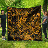 Gold and black Polynesian shark quilt with large swirling tribal and floral motif