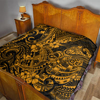 Gold and black Polynesian shark quilt on bed, ornate tribal scroll and flower design