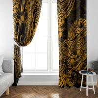 Pair of gold and dark Polynesian shark patterned curtains hanging beside a white door.