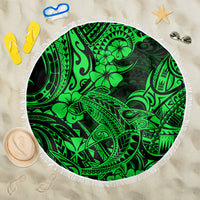 Green round beach blanket with white fringe, tribal shark and floral pattern