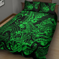 Green Polynesian-pattern bed quilt set with two pillowcases, spread across bed