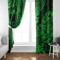 Green and black tribal window curtain panels framing a white door