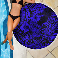 Round navy beach blanket with fringed edge and vivid blue shark Polynesian design