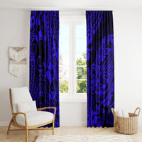 Navy blue Polynesian shark print curtains hung on a window, floor-length panels
