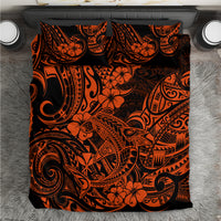 Orange and black Polynesian pattern bedding set, top view of duvet and pillow shams