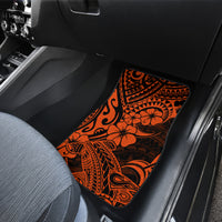 Orange Polynesian floral car floor mat on front seat, black tribal swirls pattern