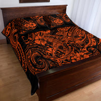 Orange and black Polynesian quilt bed set with pillow shams, overhead view