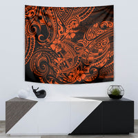 Orange and black Polynesian-style tapestry with swirling motifs and floral accents