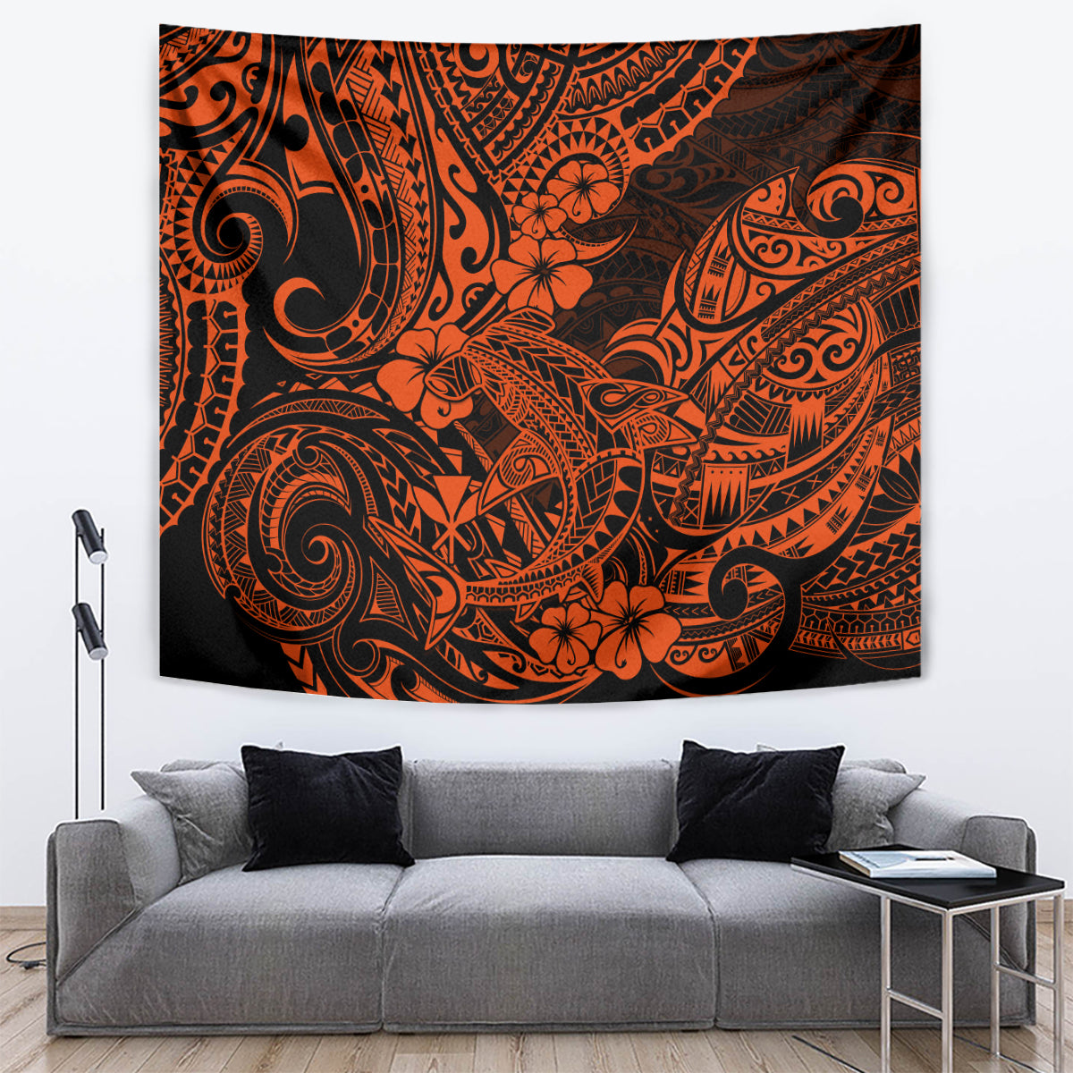 Orange and black Polynesian-inspired tapestry with shark and flame-like ornamental lines