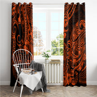 Orange and black Polynesian pattern curtains with weighted hems and full-length drape