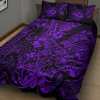 Purple and black patterned quilt bed set with two pillowcases on a bed, full spread