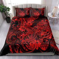 Red and black shark-themed bedding set with two pillow shams, on bed