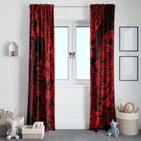 Two red and black Polynesian patterned curtain panels on front doorway
