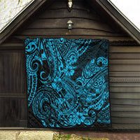 Polynesian shark quilt hanging outdoors, black base with turquoise tribal swirls and flowers