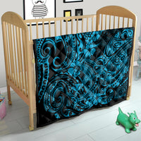 Polynesian shark quilt on crib, black base with turquoise shark tribal and flower motifs