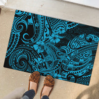 Blue Polynesian-pattern rubber doormat with dark border, rectangular, underfoot look