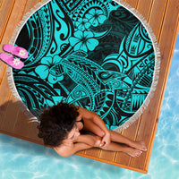 Circular turquoise beach blanket with shark tribal design, white fringe