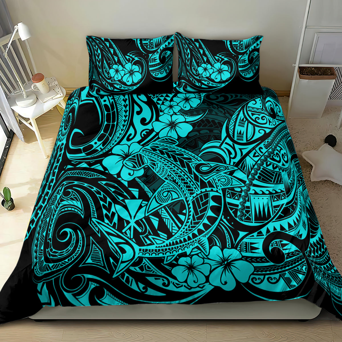 Turquoise Polynesian print bedding set on a bed with two matching pillowcases