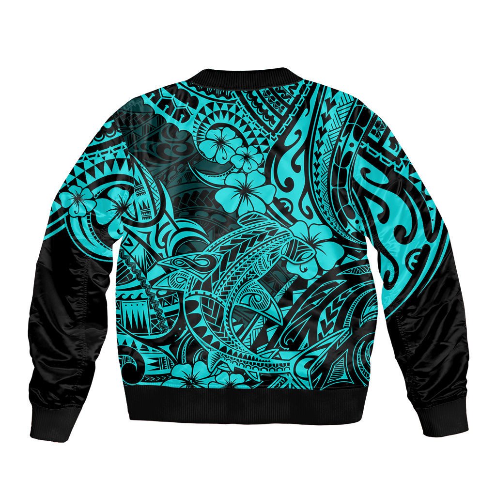 Unisex bomber jacket with turquoise Polynesian print, black sleeves, ribbed hem and cuffs