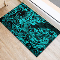 Turquoise Polynesian pattern rubber doormat, close view of ornate swirls and flowers