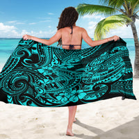 Turquoise shark print sarong wrapped around model, flowing semicircle hem