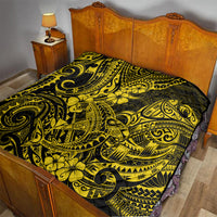 Yellow and black Polynesian shark quilt blanket on wooden bed with patterned top