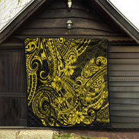 Yellow and black Polynesian shark pattern quilt hanging on dark wooden barn wall