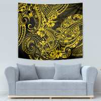 Yellow Polynesian shark tapestry on wall over gray sofa