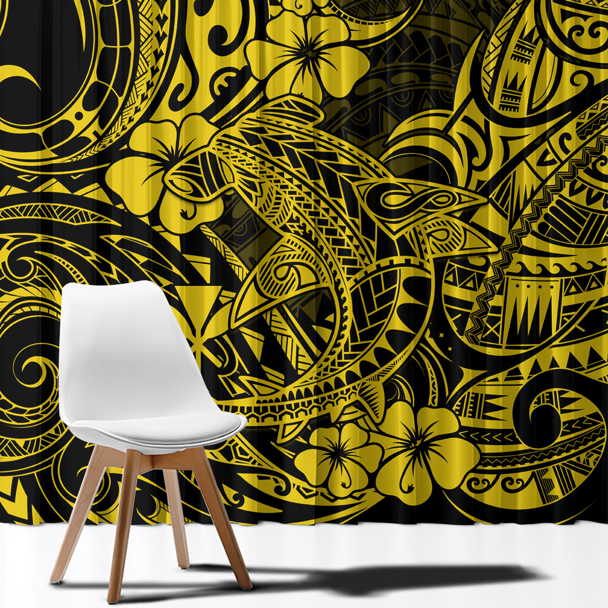 Yellow and black Polynesian patterned curtain fabric with bold swirling motifs