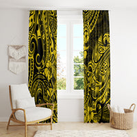 Yellow and black Polynesian patterned floor-length window curtains on a rod