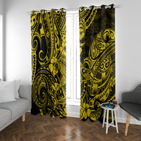 Yellow and black Polynesian patterned window curtains hanging on a ceiling rod