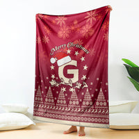 Red Christmas blanket with Santa riding reindeer, stars, snowflakes, and holiday border