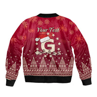 Red Christmas bomber jacket back with Santa hat graphic, stars, snowflakes, ribbed trim