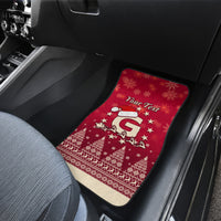 Red Christmas car floor mat with Santa and 'Your Text' pattern on front seat.