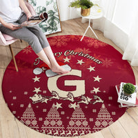 Red round Christmas rug with Merry Christmas banner, Santa riding reindeer, snowflake stars
