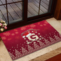 Red Christmas rubber doormat featuring Santa riding reindeer and starry Merry Christmas scene