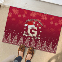 Red Christmas rubber doormat showing Santa riding reindeer with Merry Christmas text