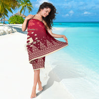 Red Christmas sarong with snowflake border print, tied waist knot