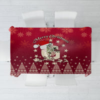 Red Christmas tablecloth with Santa riding a reindeer and festive border pattern