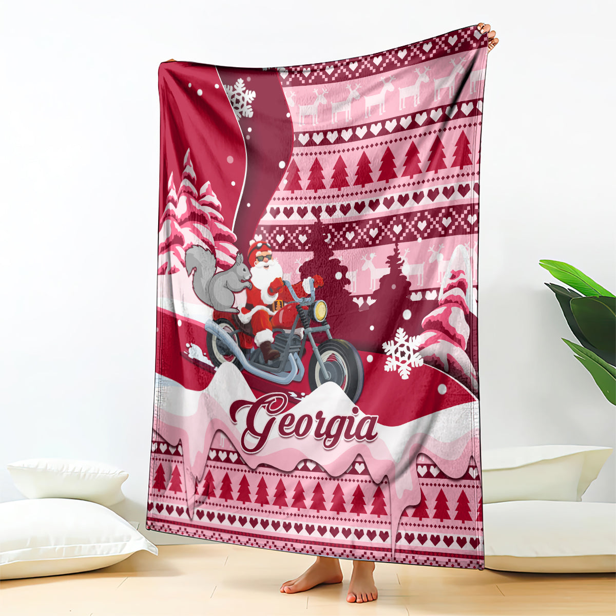 Red Christmas blanket with Georgia script, Santa on motorcycle, gray squirrel, trees and snowflakes