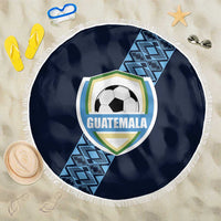 Round navy Guatemala football beach blanket with white fringe, crest and soccer-ball graphic